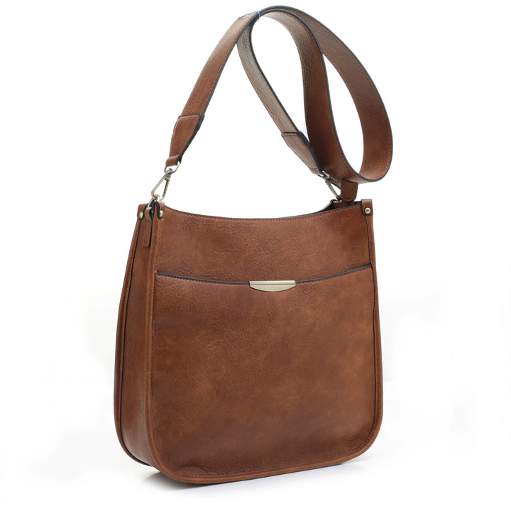 Ava Crossbody Concealed Carry Handbag by Jessie James at LovaMe Boutique in brown.