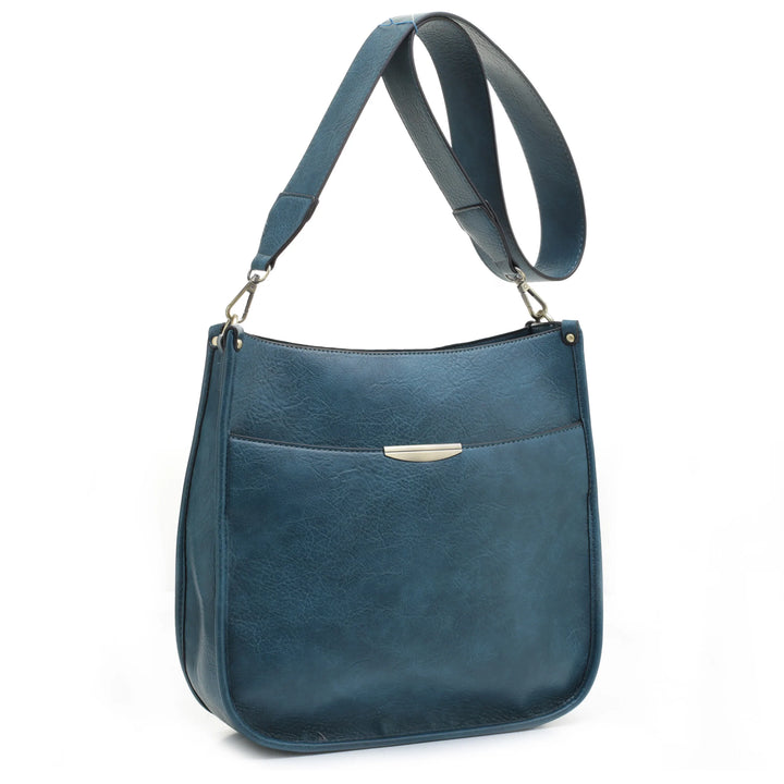 Ava Crossbody Concealed Carry Handbag by Jessie James at LovaMe Boutique in turquoise. 